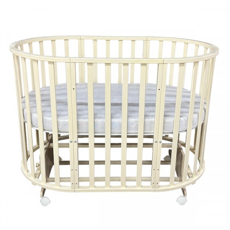 Кровать детская"Северянка 3" 6 в 1 универсальный маятник, колесо, слоновая кость